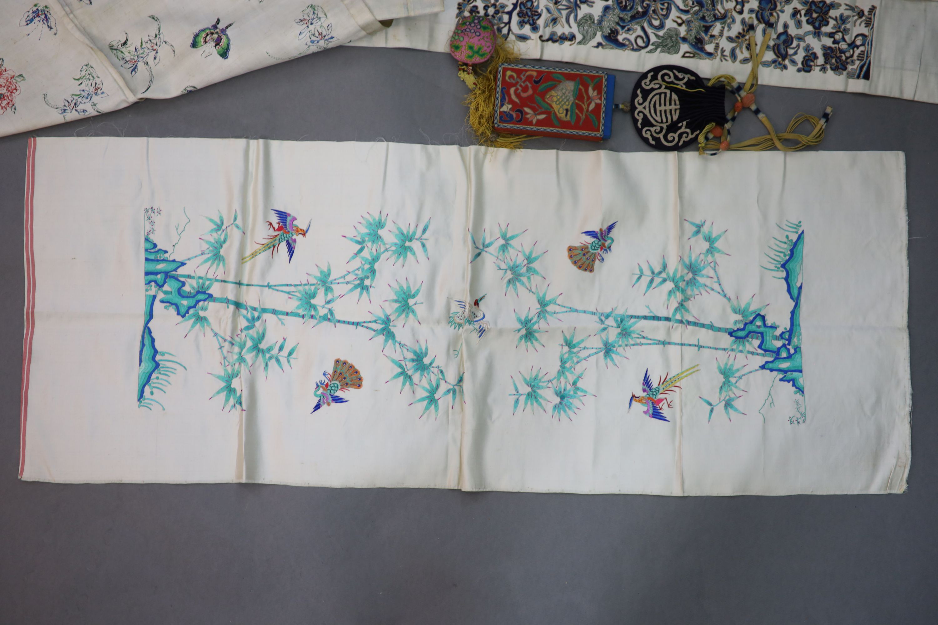 A group of Chinese embroidered silk items, late 19th/early 20th century